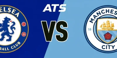 Chelsea Man City prediction banner with ats branding and a black 'vs' in the center. Backgrounds match club colours, with Chelsea in Blue on the left and Manchester City in sky blue on the right, with club badges prominent either side of the 'vs'.