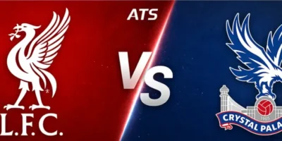 Wide horizontal banner graphic showing Liverpool vs Crystal Palace matchup, with a red left side featuring the Liverpool Liverbird crest and a blue right side featuring the Crystal Palace eagle crest, separated by a diagonal split and a glowing “VS” in the center, styled as a bold sports betting promo image.