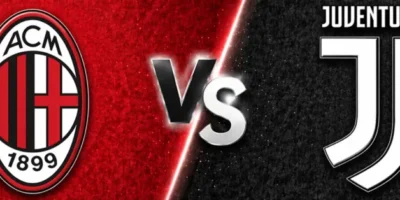 Wide sports matchup banner featuring AC Milan vs Juventus. The left side has a textured red background with a large AC Milan crest, while the right side uses a dark black and gray textured background with the Juventus logo and name. A glowing “VS” sits in the center dividing both teams, and “ATS” appears at the top in a clean, modern font.