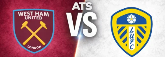 A wide sports matchup graphic featuring West Ham United and Leeds United facing off. West Ham United’s crest appears on the left over a textured claret background with faint oversized club branding in the backdrop, while Leeds’s crest is displayed on the right over a textured white background with a faded club logo watermark. A glowing diagonal divider separates the two sides, with large metallic “VS” lettering centered between the clubs. The design uses dramatic lighting, textured patterns, and soft gray borders above and below for a polished promotional match graphic.