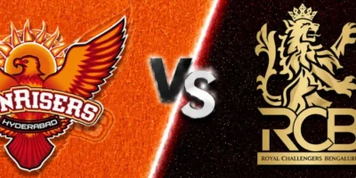 Sunrisers Hyderabad vs Royal Challengers Bengaluru match banner with both team logos on split orange and black textured backgrounds, separated by a glowing diagonal line and a metallic VS graphic in the center.