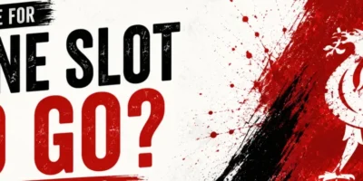 Alt text: Minimalist Liverpool-themed banner with bold black and red typography asking “Is It Time for Arne Slot to Go at Liverpool?”, featuring abstract paint splashes and a stylized liver bird emblem on a textured white background.