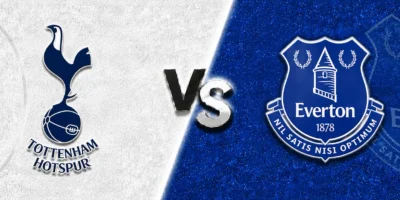 Tottenham Hotspur vs Everton match prediction banner with the Spurs crest on a clean white textured background and the Everton crest on a deep blue textured background, split by a bold central “VS” graphic.
