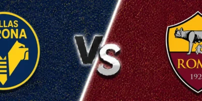 Hellas Verona vs Roma match prediction banner with the Verona crest on a dark blue textured background and the Roma crest on a deep maroon textured background, separated by a bold metallic “VS” graphic.